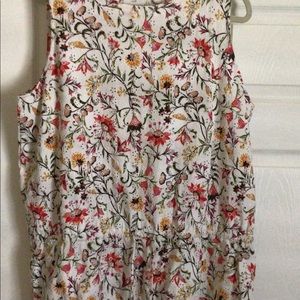 White background floral design blouse.